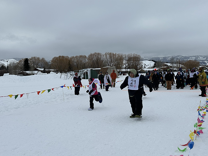 Group of athletes enjoying the snowshoeing event
