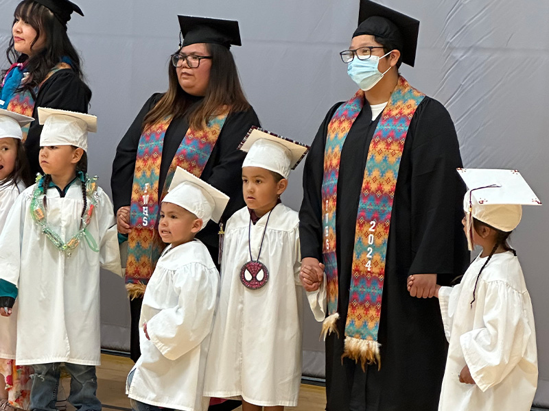 SPED students on a stage during graduation